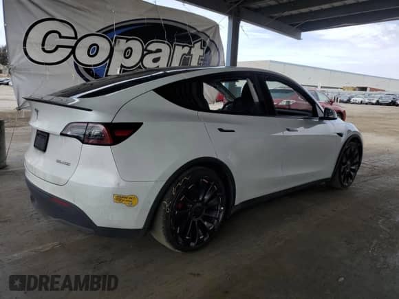 2022 Tesla Model Y Performance с VIN 7SAYGDEF0NF487098, выставлен на аукционе Copart как лот 80744715 с пробегом 39 557 миль миль и Списание • Salvage title. История ставок и продаж доступна на DreamBid. Изображение 3.