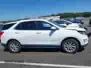 2019 Chevrolet Equinox LT z VIN 3GNAXKEV3KS513620, wystawiony jako IAAI lot #43118340 z przebiegiem 154 243 mil mil oraz . Historia ofert i sprzedaży dostępna na DreamBid. Obrazek 13.