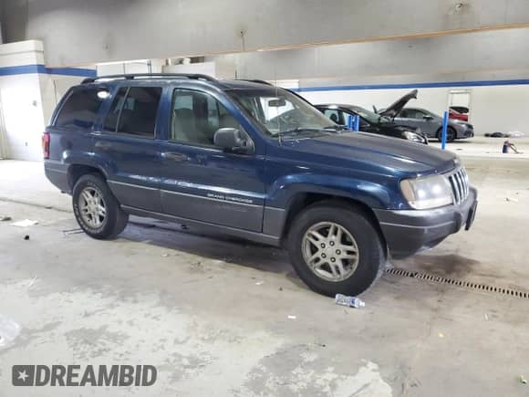 2003 Jeep Grand Cherokee Laredo z VIN 1J4GX48S13C543068, wystawiony jako Copart lot #86249205 z przebiegiem 200 531 mil mil oraz Czysty tytuł • Clean title. Historia ofert i sprzedaży dostępna na DreamBid. Obrazek 4.