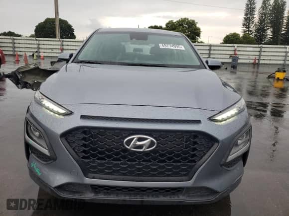 2021 Hyundai Kona SE с VIN KM8K12AAXMU665815, выставлен на аукционе Copart как лот 69774995 с пробегом 31 266 миль миль и На запчасти • Non repairable. История ставок и продаж доступна на DreamBid. Изображение 5.