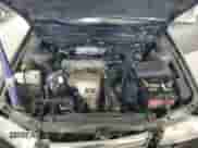 2000 Toyota Camry LE z VIN JT2BG22K5Y0403037, wystawiony jako Copart lot #84022845 z przebiegiem 310 731 mil mil oraz Czysty tytuł • Clean title. Historia ofert i sprzedaży dostępna na DreamBid. Obrazek 11.