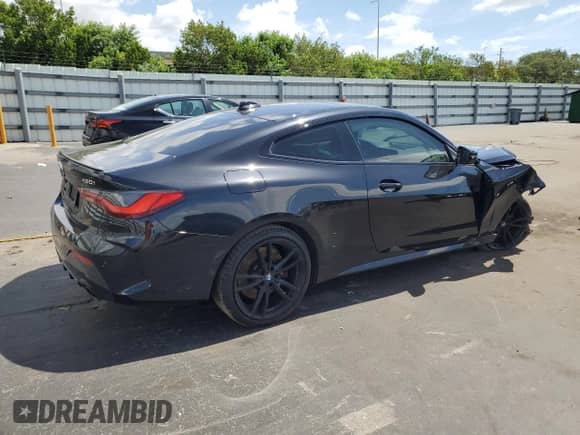 2022 BMW 4 Series 430i with VIN WBA53AP02NCJ83946, listed as a Copart auction lot 61433115 with 56,572 mi miles and Non repairable. Bid and sale history available at DreamBid. Image 3.