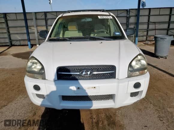 2006 Hyundai Tucson GL z VIN KM8JM12B96U438932, wystawiony jako Copart lot #64012915 z przebiegiem 137 136 mil mil oraz Szkoda całkowita • Salvage title. Historia ofert i sprzedaży dostępna na DreamBid. Obrazek 5.