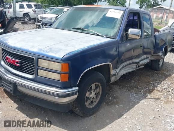 1994 GMC Sierra 1500 z VIN 2GTEC19K1R1517591, wystawiony jako IAAI lot #42712179 z przebiegiem 334 450 mil mil oraz . Historia ofert i sprzedaży dostępna na DreamBid. Obrazek 2.