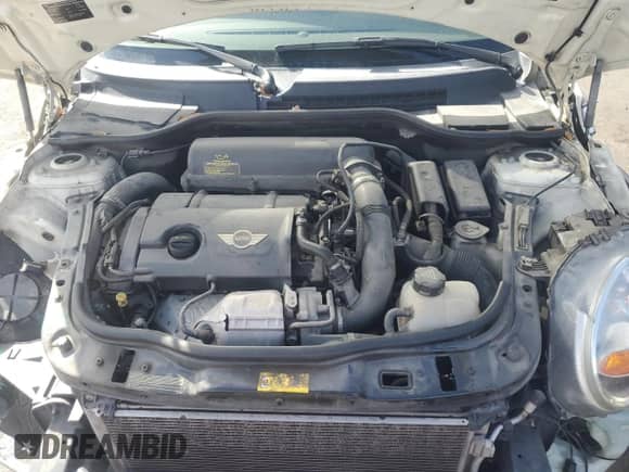 2013 MINI Hardtop S z VIN WMWSV3C53DT388538, wystawiony jako Copart lot #82251775 z przebiegiem 107 896 mil mil oraz Szkoda całkowita • Salvage title. Historia ofert i sprzedaży dostępna na DreamBid. Obrazek 11.