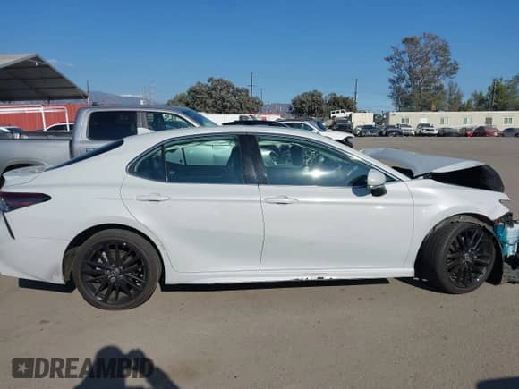 2023 Toyota Camry Hybrid XSE с VIN 4T1K31AK8PU052738, выставлен на аукционе IAAI как лот 43315522 с пробегом 93 968 миль миль и . История ставок и продаж доступна на DreamBid. Изображение 12.