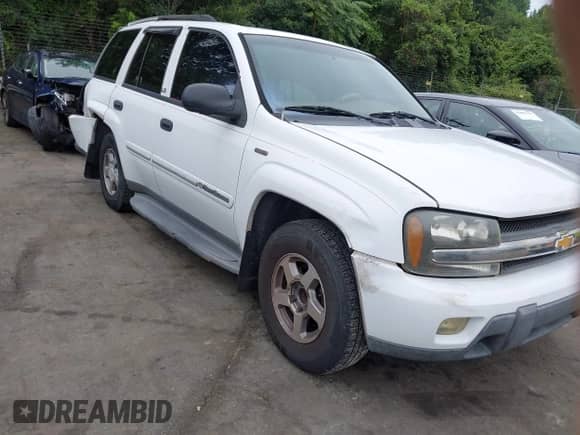2003 Chevrolet TrailBlazer LS z VIN 1GNDS13SX32188296, wystawiony jako IAAI lot #42892717 z przebiegiem 258 496 mil mil oraz . Historia ofert i sprzedaży dostępna na DreamBid. Obrazek 1.