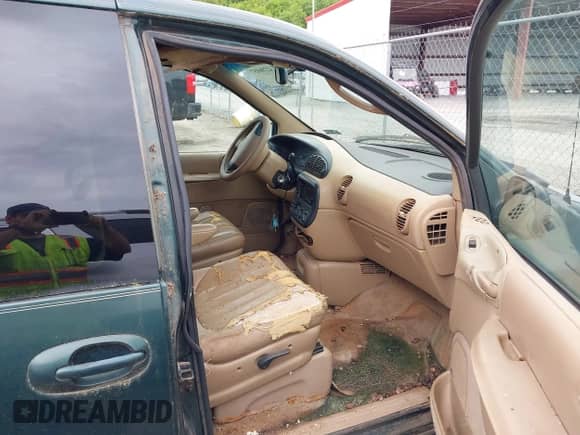 1997 Dodge Grand Caravan with VIN 1B4GT54L6VB439994, listed as a IAAI auction lot 42206857 with 242,219 mi miles and . Bid and sale history available at DreamBid. Image 5.