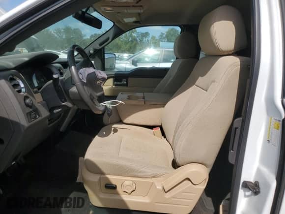 2012 Ford F-150 XL с VIN 1FTEX1CM7CFC16144, выставлен на аукционе Copart как лот 70816605 с пробегом 175 979 миль миль и Списание • Salvage title. История ставок и продаж доступна на DreamBid. Изображение 7.
