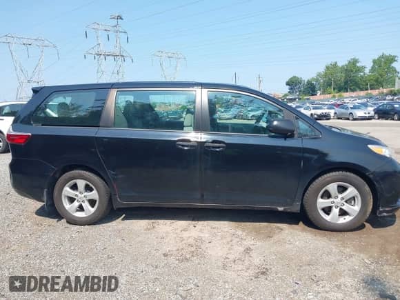 2015 Toyota Sienna L with VIN 5TDZK3DC1FS539076, listed as a IAAI auction lot 42913036 with 118,898 mi miles and . Bid and sale history available at DreamBid. Image 14.