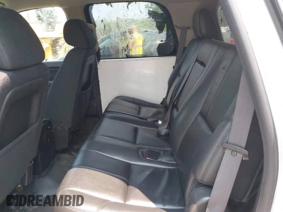 2014 Chevrolet Tahoe Commercial with VIN 1GNLC2E07ER228838, listed as a IAAI auction lot 42410417 with 140,342 mi miles and . Bid and sale history available at DreamBid. Image 8.