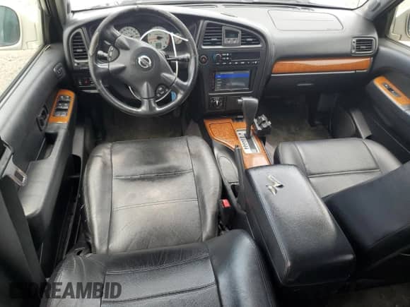 2003 Nissan Pathfinder LE with VIN JN8DR09Y93W800267, listed as a Copart auction lot 62574235 with 203,018 mi miles and Salvage title. Bid and sale history available at DreamBid. Image 8.