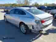 2018 Chevrolet Malibu LT z VIN 1G1ZD5STXJF268187, wystawiony jako IAAI lot #43439529 z przebiegiem 97 042 mil mil oraz . Historia ofert i sprzedaży dostępna na DreamBid. Obrazek 3.