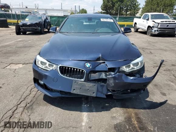 2016 BMW 4 Series 428i xDrive z VIN WBA4C9C50GG140732, wystawiony jako Copart lot #66198135 z przebiegiem 80 977 mil mil oraz Szkoda całkowita • Salvage title. Historia ofert i sprzedaży dostępna na DreamBid. Obrazek 5.