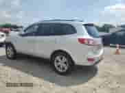 2012 Hyundai Santa Fe SE с VIN 5XYZH4AG8CG121070, выставлен на аукционе Copart как лот 69295455 с пробегом 138 134 миль миль и Списание • Salvage title. История ставок и продаж доступна на DreamBid. Изображение 2.