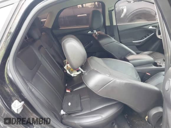 2014 Ford Focus Titanium with VIN 1FADP3N28EL205151, listed as a IAAI auction lot 43409829 with 126,461 mi miles and . Bid and sale history available at DreamBid. Image 8.