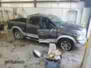 2014 Ram 1500 Laramie with VIN 1C6RR7NT5ES375183, listed as a Copart auction lot 85163365 with 149,376 mi miles and Salvage title. Bid and sale history available at DreamBid. Image 4.