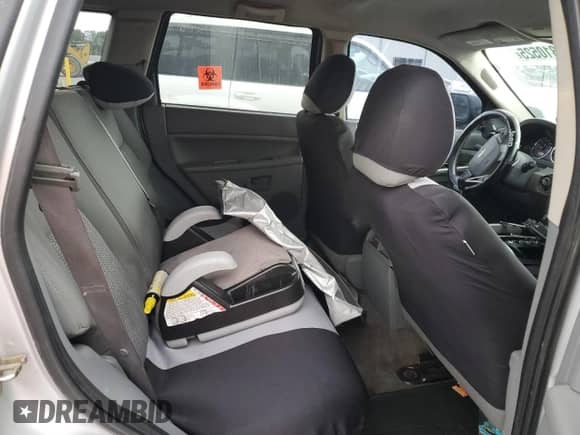 2007 Jeep Grand Cherokee Laredo z VIN 1J8GS48K67C517746, wystawiony jako Copart lot #80310525 z przebiegiem 211 900 mil mil oraz Nie do naprawy • Non repairable. Historia ofert i sprzedaży dostępna na DreamBid. Obrazek 11.