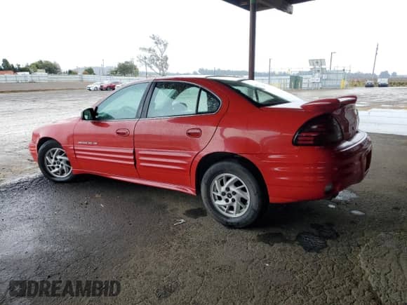 2001 Pontiac Grand Am SE1 с VIN 1G2NF52EX1C242261, выставлен на аукционе Copart как лот 82236874 с пробегом 184 935 миль миль и Списание • Salvage title. История ставок и продаж доступна на DreamBid. Изображение 2.