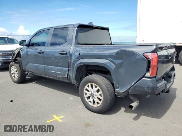 2024 Toyota Tacoma SR with VIN 3TYKD5HN7RT003129, listed as a Copart auction lot 63349125 with 15,244 mi miles and Salvage title. Bid and sale history available at DreamBid. Image 2.