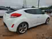 2013 Hyundai Veloster w/Black Int с VIN KMHTC6AD0DU149690, выставлен на аукционе Copart как лот 68201775 с пробегом 112 030 миль миль и Списание • Salvage title. История ставок и продаж доступна на DreamBid. Изображение 3.
