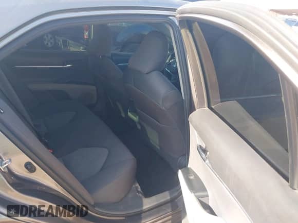 2020 Toyota Camry LE with VIN 4T1C11AK9LU391108, listed as a IAAI auction lot 43087805 with 88,386 mi miles and . Bid and sale history available at DreamBid. Image 8.