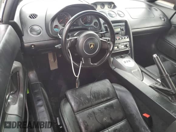 2005 Lamborghini Gallardo с VIN ZHWGU11S35LA02379, выставлен на аукционе Copart как лот 75365184 с пробегом 23 102 миль миль и На запчасти • Non repairable. История ставок и продаж доступна на DreamBid. Изображение 8.
