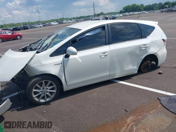 2013 Toyota Prius Two with VIN JTDZN3EUXD3264465, listed as a IAAI auction lot 42589831 with 188,493 mi miles and . Bid and sale history available at DreamBid. Image 2.