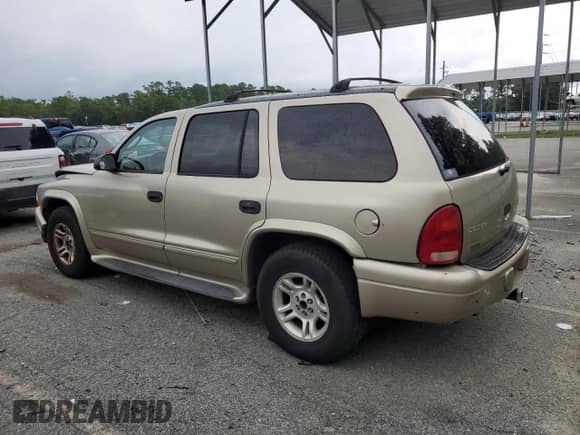 2003 Dodge Durango SLT with VIN 1D4HR48N83F560384, listed as a Copart auction lot 69909915 with 187,826 mi miles and Salvage title. Bid and sale history available at DreamBid. Image 2.