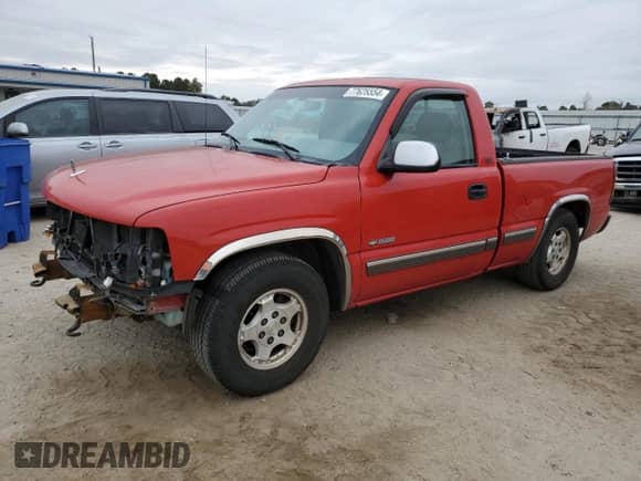 2000 Chevrolet Silverado 1500 LS with VIN 1GCEC14TXYZ153158, listed as a Copart auction lot 77625554 with 214,960 mi miles and Salvage title. Bid and sale history available at DreamBid. Image 1.