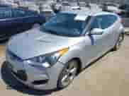 2012 Hyundai Veloster w/Gray Int z VIN KMHTC6AD6CU079711, wystawiony jako IAAI lot #41750279 z przebiegiem 154 746 mil mil oraz . Historia ofert i sprzedaży dostępna na DreamBid. Obrazek 2.