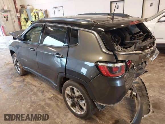 2019 Jeep Compass Limited with VIN 3C4NJDCB1KT780880, listed as a IAAI auction lot 43297174 with 76,843 mi miles and . Bid and sale history available at DreamBid. Image 3.