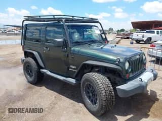2012 Jeep Wrangler Sahara with VIN 1C4AJWBGXCL100527, listed as a IAAI auction lot 42394623 with 126,097 mi miles and . Bid and sale history available at DreamBid. Image 1.