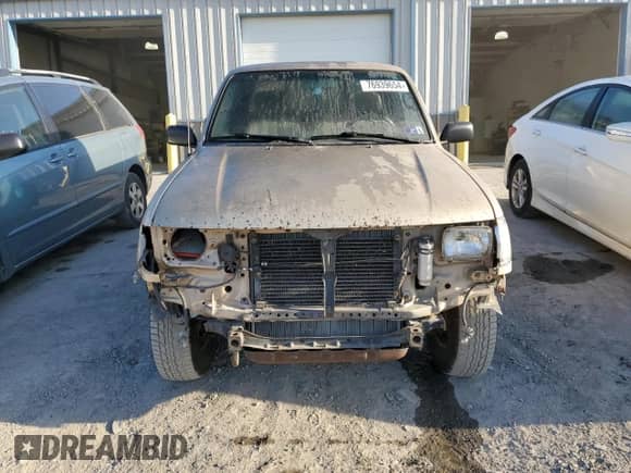 1997 Toyota Tacoma z VIN 4TAWM72N3VZ308584, wystawiony jako Copart lot #76939654 z przebiegiem 259 695 mil mil oraz Szkoda całkowita • Salvage title. Historia ofert i sprzedaży dostępna na DreamBid. Obrazek 5.