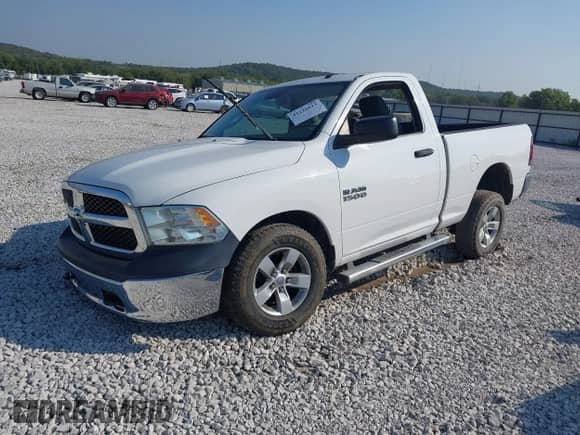 2014 Ram 1500 Tradesman z VIN 3C6JR7AG8EG278332, wystawiony jako IAAI lot #43226613 z przebiegiem 132 145 mil mil oraz . Historia ofert i sprzedaży dostępna na DreamBid. Obrazek 2.