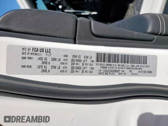 2017 Jeep Grand Cherokee Overland with VIN 1C4RJECG4HC965657, listed as a Copart auction lot 84400635 with 141,055 mi miles and Salvage title. Bid and sale history available at DreamBid. Image 13.