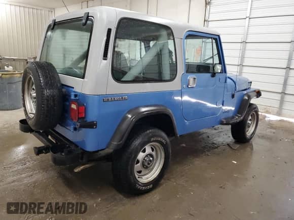 1989 Jeep Wrangler with VIN 2J4FY29M0KJ109399, listed as a Copart auction lot 72358094 with 129,730 mi miles and Salvage title. Bid and sale history available at DreamBid. Image 3.