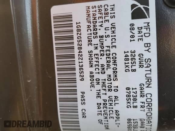 2002 Saturn SL with VIN 1G8ZG52842Z136529, listed as a Copart auction lot 69322825 with 215,279 mi miles and Salvage title. Bid and sale history available at DreamBid. Image 12.