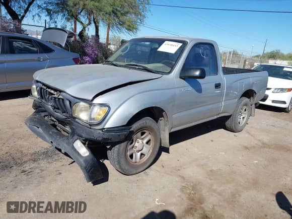 2002 Toyota Tacoma with VIN 5TENL42N62Z036467, listed as a IAAI auction lot 43538453 with Not provided miles and . Bid and sale history available at DreamBid. Image 2.