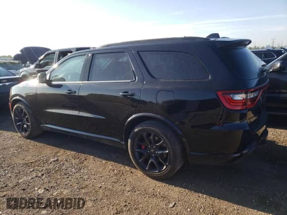 2023 Dodge Durango R/T Plus with VIN 1C4SDJCT2PC584757, listed as a Copart auction lot 68424405 with 74,835 mi miles and Salvage title. Bid and sale history available at DreamBid. Image 2.