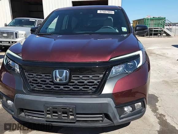2020 Honda Passport EX-L with VIN 5FNYF7H51LB004722, listed as a Copart auction lot 87407905 with 28,860 mi miles and Salvage title. Bid and sale history available at DreamBid. Image 14.