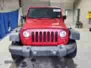 2009 Jeep Wrangler X с VIN 1J4FA24109L733404, выставлен на аукционе Copart как лот 82075825 с пробегом 149 544 миль миль и Списание • Salvage title. История ставок и продаж доступна на DreamBid. Изображение 5.
