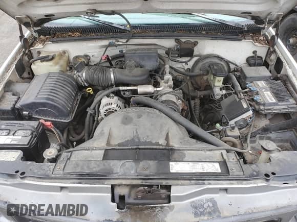 1997 GMC Sierra 1500 z VIN 1GTEK14W6VZ549578, wystawiony jako Copart lot #67808705 z przebiegiem 203 467 mil mil oraz Czysty tytuł • Clean title. Historia ofert i sprzedaży dostępna na DreamBid. Obrazek 11.