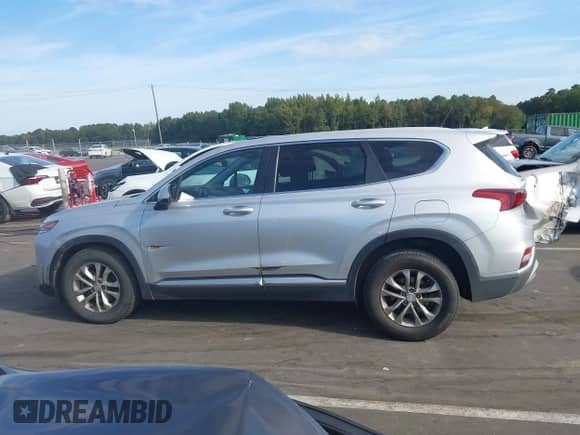 2019 Hyundai Santa Fe SE с VIN 5NMS2CAD3KH082248, выставлен на аукционе IAAI как лот 43286639 с пробегом 95 291 миль миль и . История ставок и продаж доступна на DreamBid. Изображение 14.