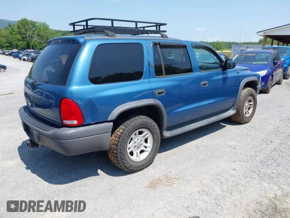 2003 Dodge Durango Sport z VIN 1D4HS38N53F510492, wystawiony jako IAAI lot #42378667 z przebiegiem 170 968 mil mil oraz . Historia ofert i sprzedaży dostępna na DreamBid. Obrazek 4.