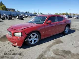 2010 Dodge Charger SXT with VIN 2B3CA3CV0AH172403, listed as a Copart auction lot 70203524 with 246,676 mi miles and Salvage title. Bid and sale history available at DreamBid. Image 1.
