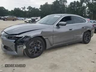 2023 BMW i4 eDrive35 with VIN WBY43AW0XPFP98552, listed as a Copart auction lot 63310845 with 13,769 mi miles and Salvage title. Bid and sale history available at DreamBid. Image 1.