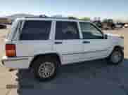 1995 Jeep Grand Cherokee Limited with VIN 1J4GZ78Y3SC701103, listed as a Copart auction lot 72038184 with 143,829 mi miles and Salvage title. Bid and sale history available at DreamBid. Image 3.