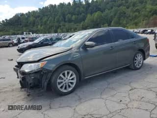 2014 Toyota Camry LE with VIN 4T1BD1FK6EU097986, listed as a Copart auction lot 70822595 with 159,238 mi miles and Salvage title. Bid and sale history available at DreamBid. Image 1.