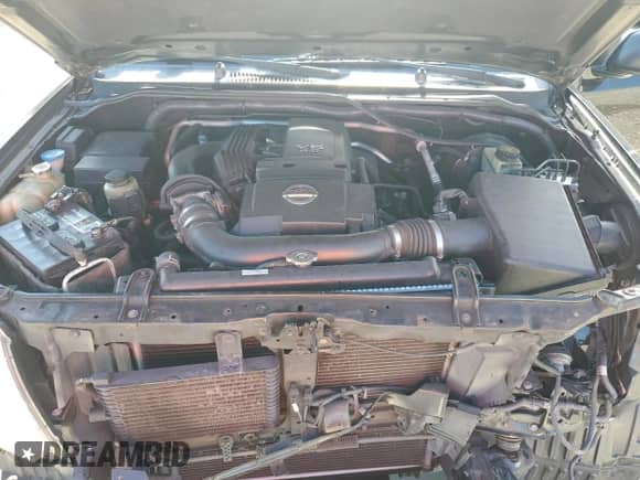 2016 Nissan Frontier SV z VIN 1N6AD0EV0GN738159, wystawiony jako Copart lot #68360445 z przebiegiem 169 872 mil mil oraz Szkoda całkowita • Salvage title. Historia ofert i sprzedaży dostępna na DreamBid. Obrazek 11.